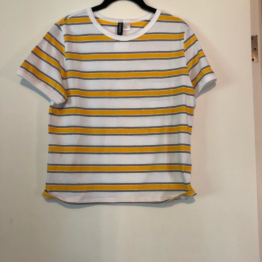 White yellow and black striped shirt